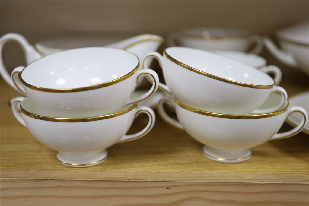 A Wedgwood California pattern gilt edged part dinner service